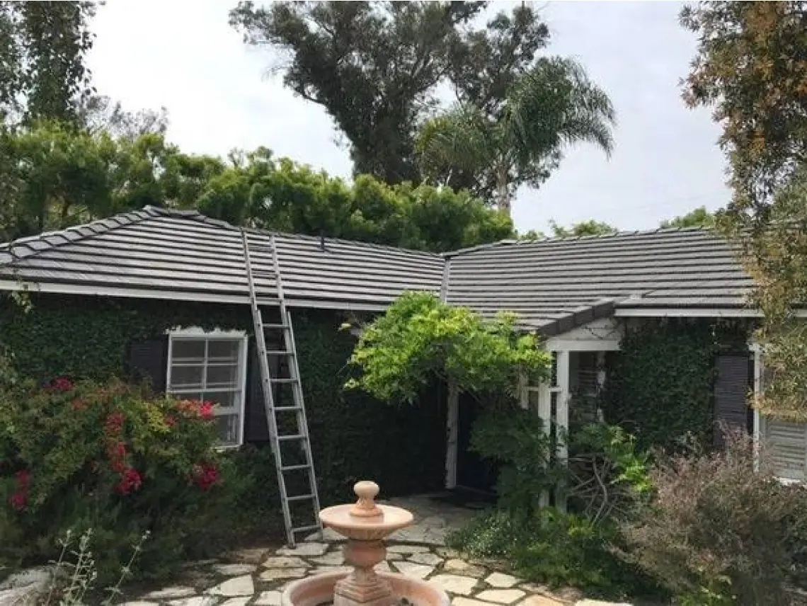 Dark roof above a courtyard from Team All Star Construction’s residential portfolio